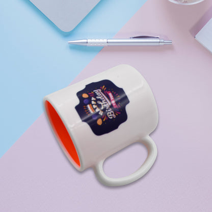 High-quality designer coffee mug with a spoon, highlighting its intricate pattern.