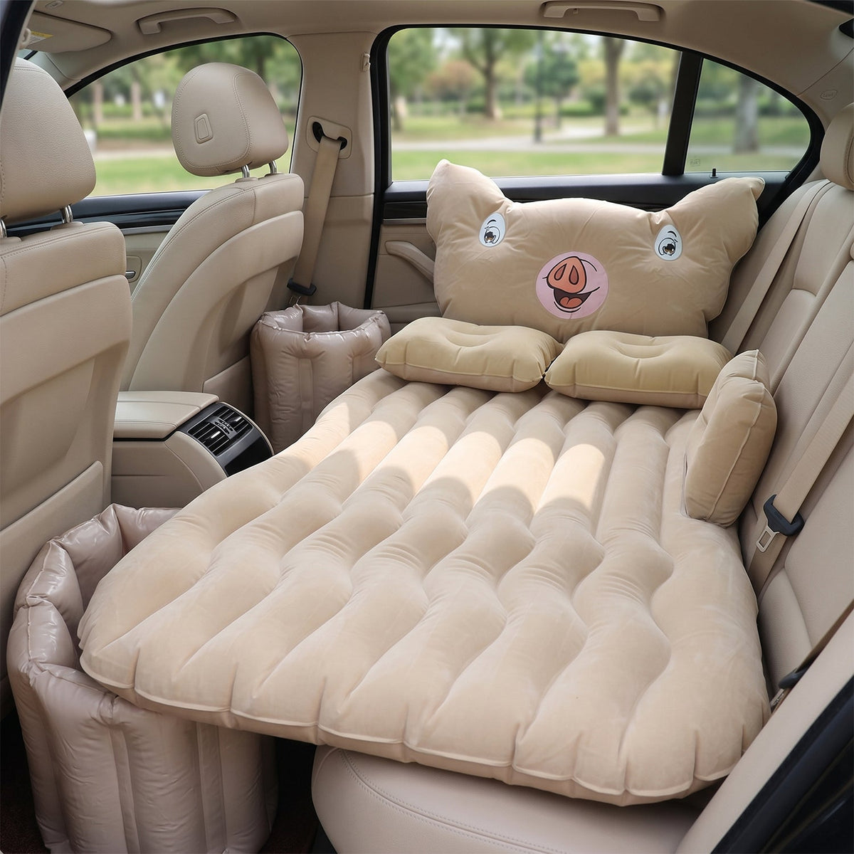Inflatable car mattress installed in sedan back seat for travel