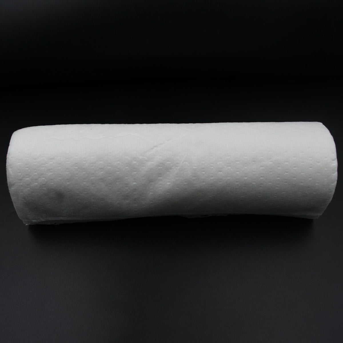Printed kitchen tissue roll from Velvet Wipe, highlighting its thickness and design.