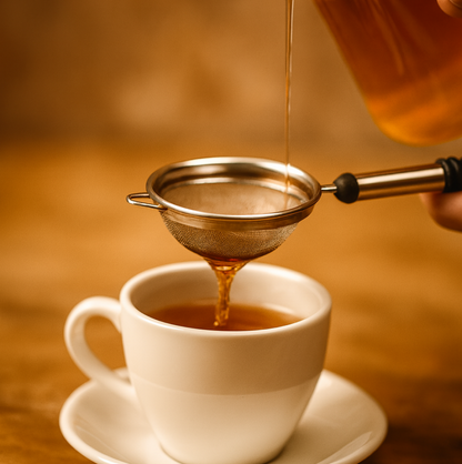 Macro shot revealing the ultra-fine mesh of the durable stainless steel kitchen strainer.