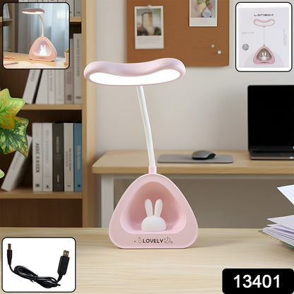 Adjustable LED desk lamp illuminating a study setup