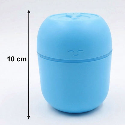 The USB Air Humidifier in a car cup holder, demonstrating its travel-friendly design.